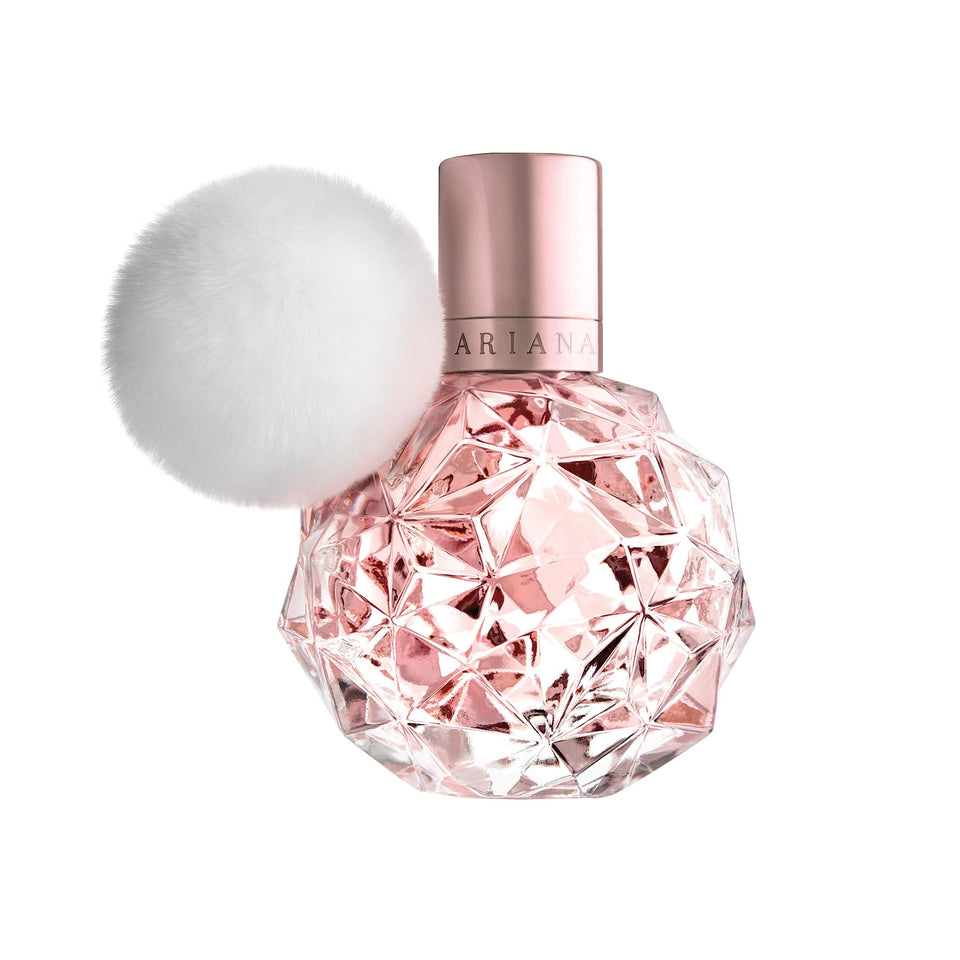 Ariana Grande Ari EDP bottle close-up with rose-gold accents for chic everyday vibe.