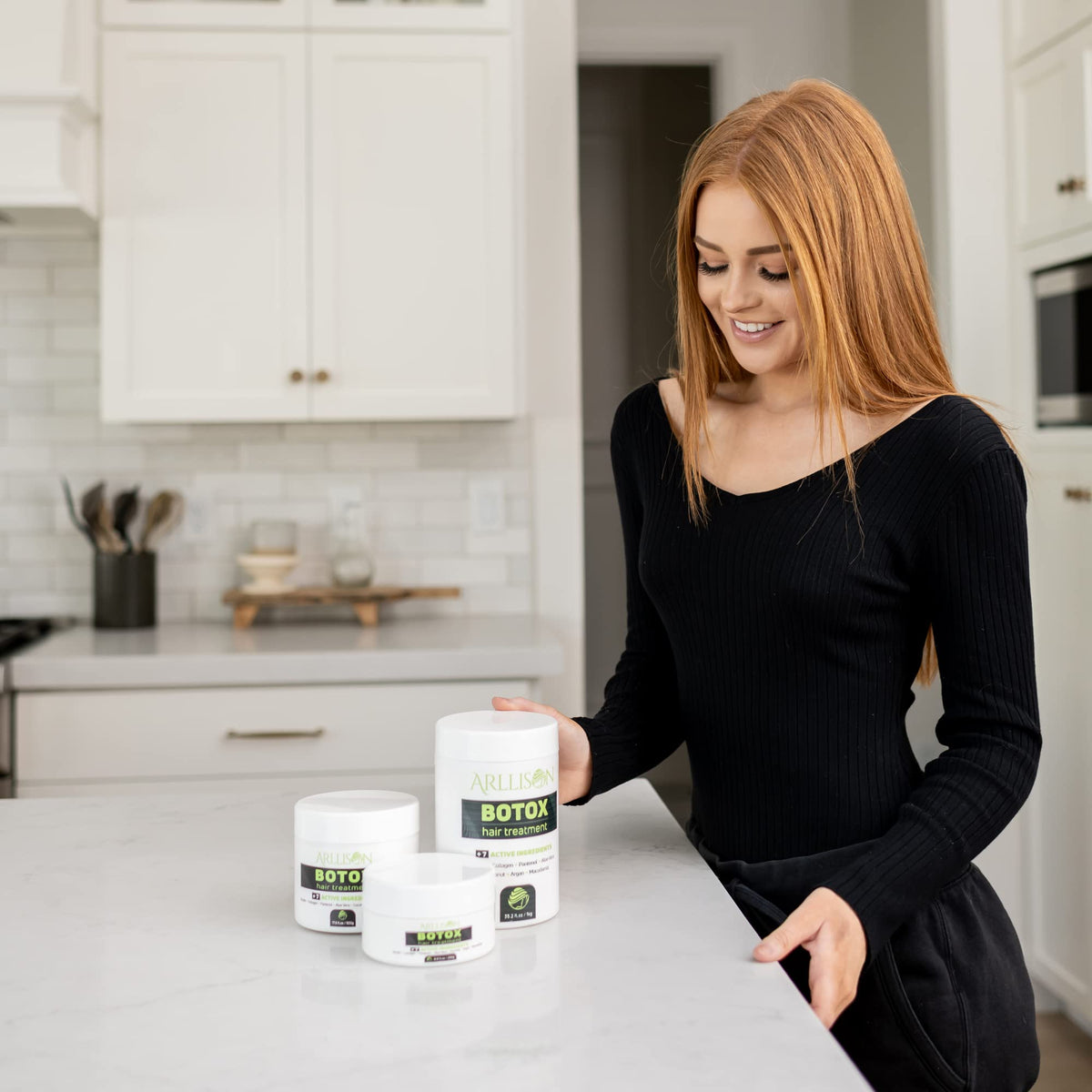 Arllison treatment applied to wet hair in even sections.
