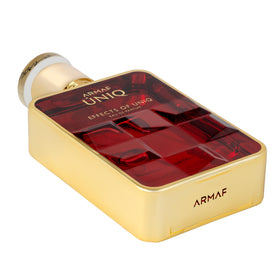 Armaf Uniq bottle displays mandarin top note for a fresh vibe.
