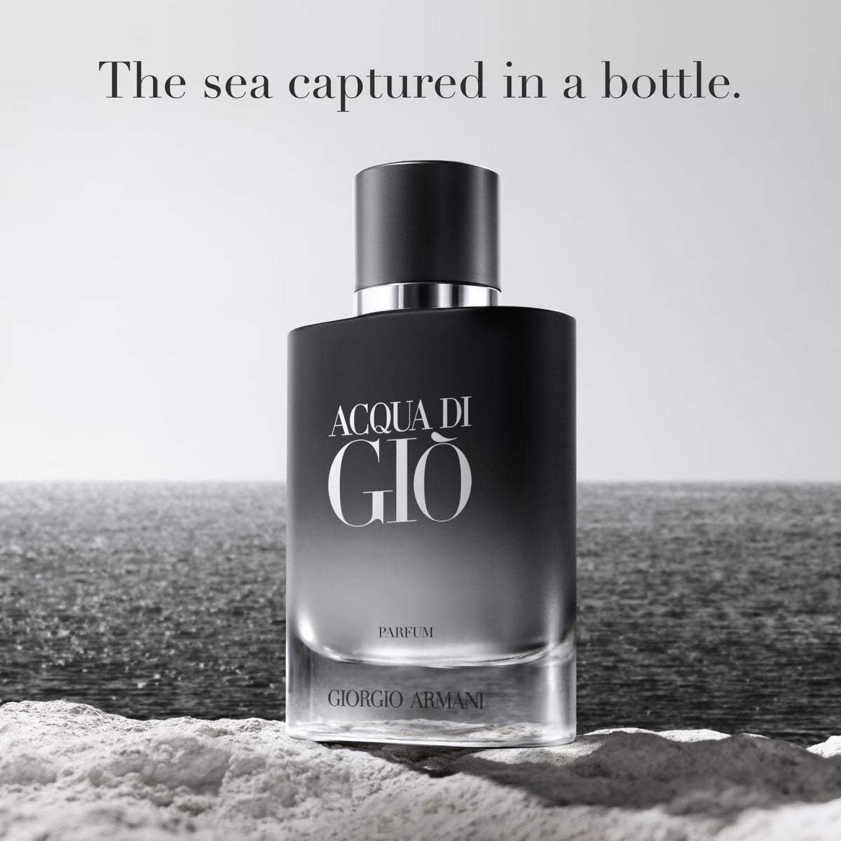 Armani Beauty Acqua di Giò Parfum bottle on skin demonstrates lasting fresh profile.