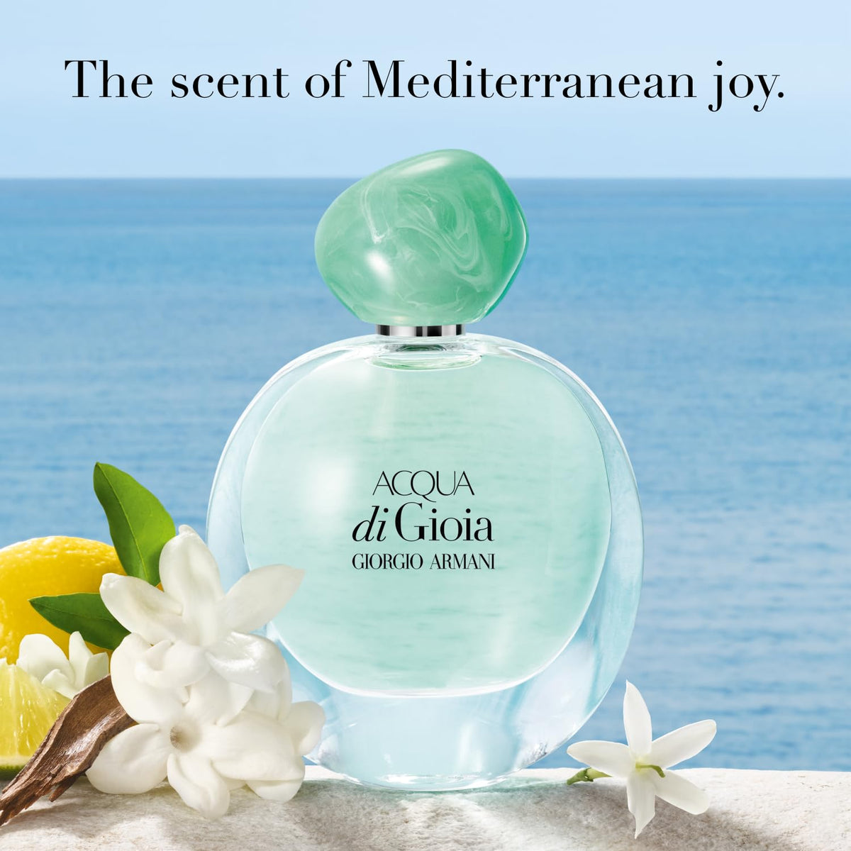 Close-up of Armani Beauty Acqua di Gioia EDP bottle highlighting glass detail.