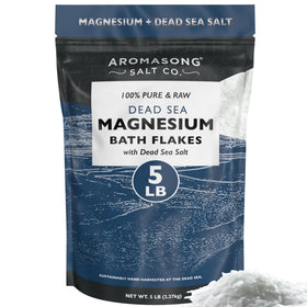 Aromasong raw magnesium flakes in a bathtub pour for a soothing soak