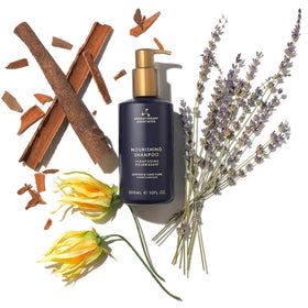 Aromatherapy Associates Balance Shampoo lavender and ylang-ylang illustration conveys calming aroma.