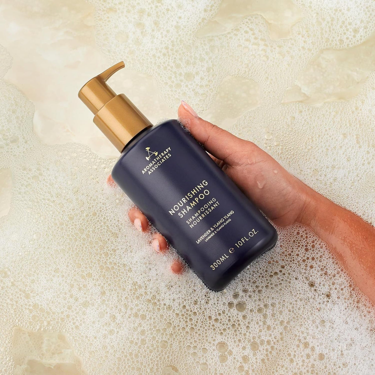 Aromatherapy Associates Balance Shampoo sustainable packaging close-up with post-consumer materials.