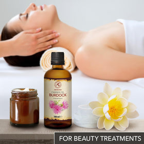 AROMATIKA Burdock Root Oil label close-up, conveying 100% pure and natural ingredients.