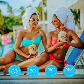 ARUBA SUN SPF 30 lotion being massaged into skin for hydration.