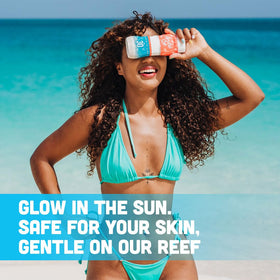 ARUBA SUN USA-made sunscreen lotion on tropical backdrop for outdoor protection.
