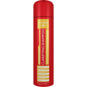 Arvazallia Clarifying Shampoo bottle pouring for a deep cleanse.