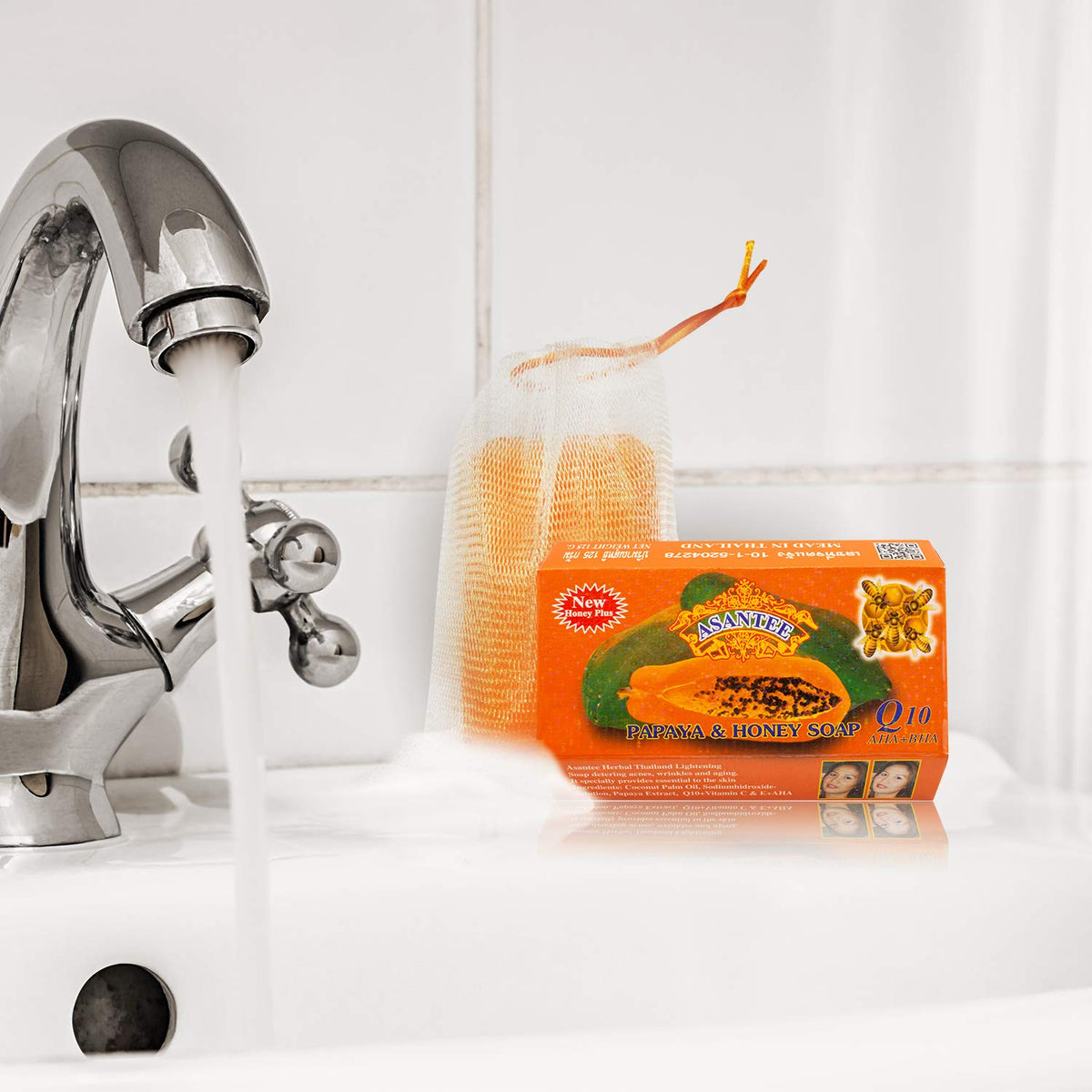 ASANTEE Papaya & Honey Soap Bar unwrapped shows natural ingredients for nourishing skin.