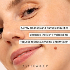 Asterwood HOCl spray mist on a cheek illustrating refreshing post-workout hydration.