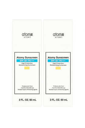 A.t.o.m.y Sunscreen bottle front view showing beige formula and broad protection.