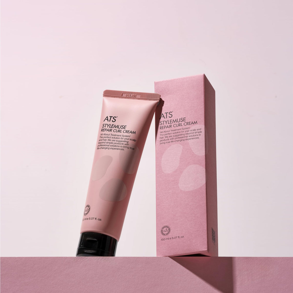 ATS Professional STYLEMUSE Repair Curl Cream applied to hands showing smooth texture for easy styling