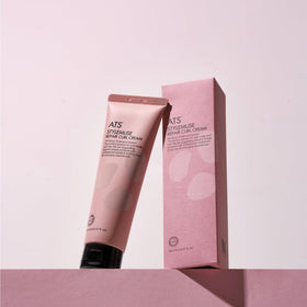 ATS Professional STYLEMUSE Repair Curl Cream applied to hands showing smooth texture for easy styling