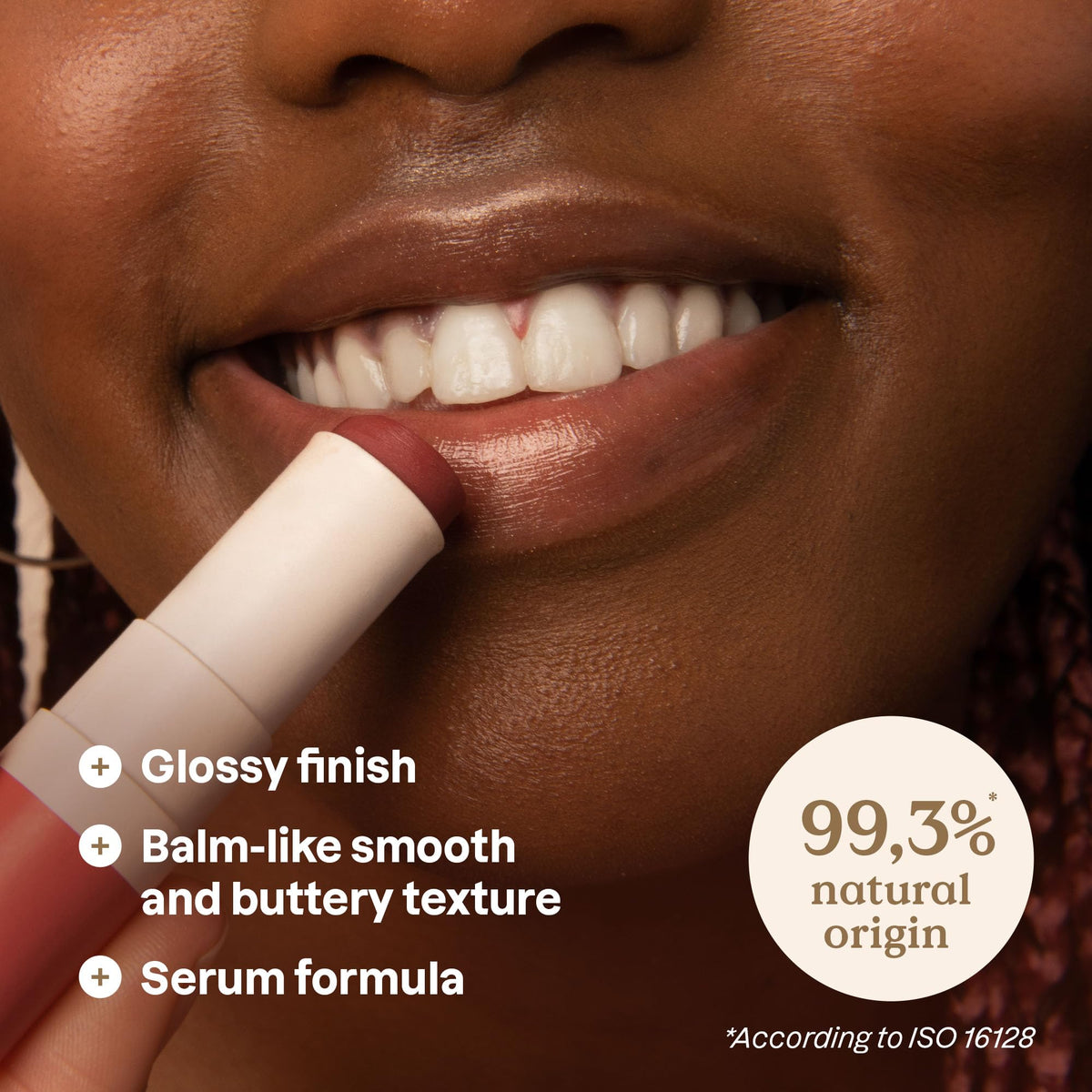 ATTITUDE Oceanly lip gloss stick texture shows balm-like glide without stickiness