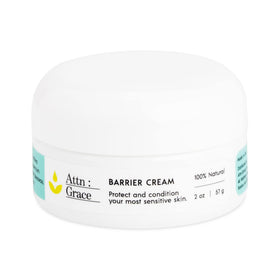 ATTN : GRACE Barrier Cream jar close-up shows rich texture for dry skin relief.