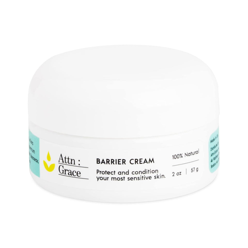 ATTN : GRACE Barrier Cream jar close-up shows rich texture for dry skin relief.