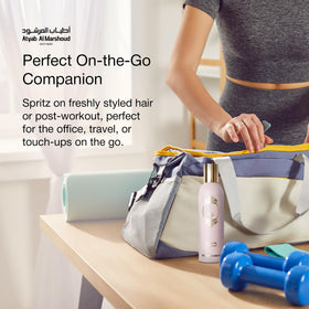 ATYAB AL MARSHOUD Pink Khisla Hair Mist dispensing a gentle mist.