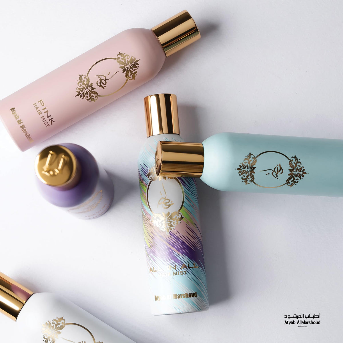 ATYAB AL MARSHOUD Pink Khisla Hair Mist on a stylish vanity setup.