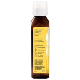 Close-up of Aura Cacia Balancing Jojoba Oil texture showing smooth, non-greasy finish