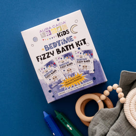 Aura Cacia Kids Bedtime Fizzy Bath Kit child in bath enjoys soft skin after