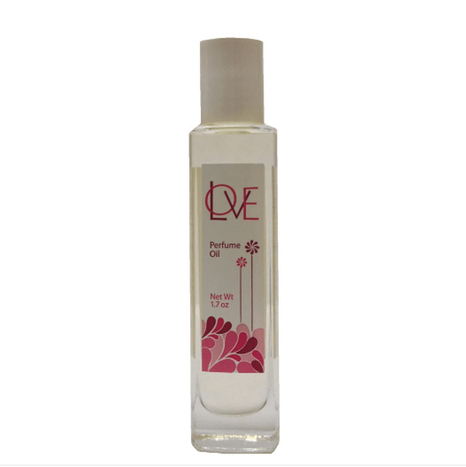 Auric Blends Love Perfume Oil bottle on right, inviting daily wear with a warm aroma.