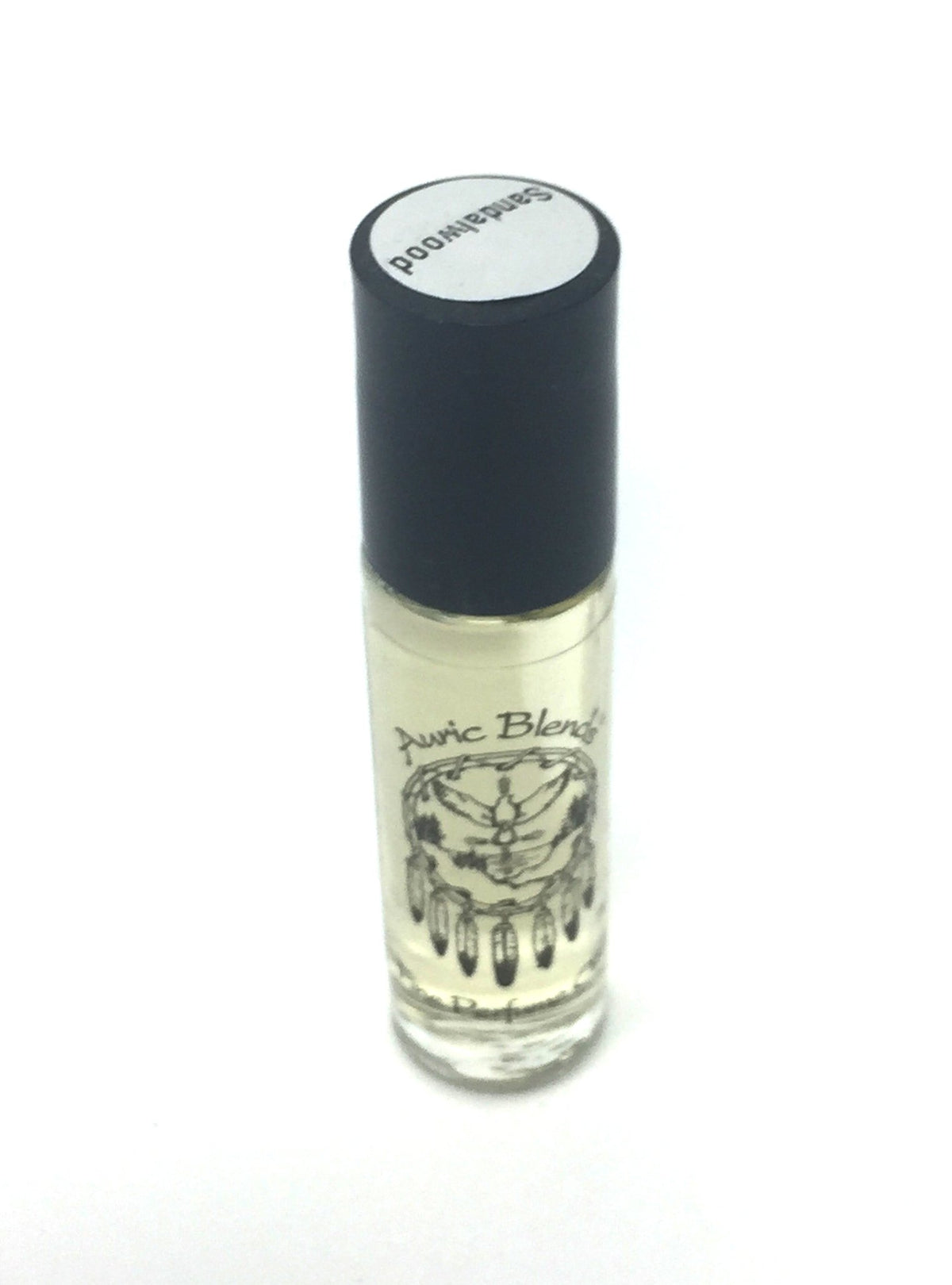 Cap closeup of Auric Blends Sandalwood Roll-On showing easy use