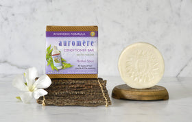 Auromere conditioner bar delivers silky, moisturized hair after use.