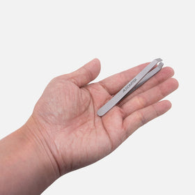 AUSOMTEK beard tweezers in clear packaging box for gifting.