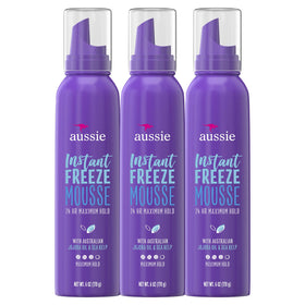 Aussie Mousse Instant Freeze can closeup highlighting instant hold for style.