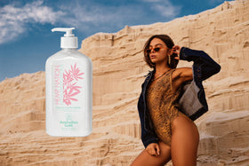 Australian Gold Hemp Nation application close-up: hands massaging for even coverage.