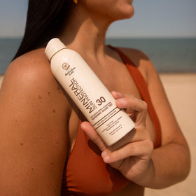 Australian Gold sunscreen spray outdoors ideal for hikes and pool days