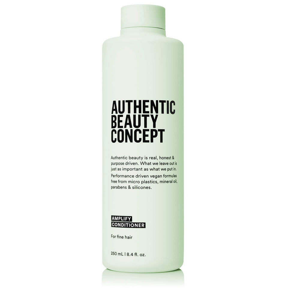 Authentic Beauty Concept Amplify Conditioner bottle highlights lightweight, volumizing formula for fine hair.