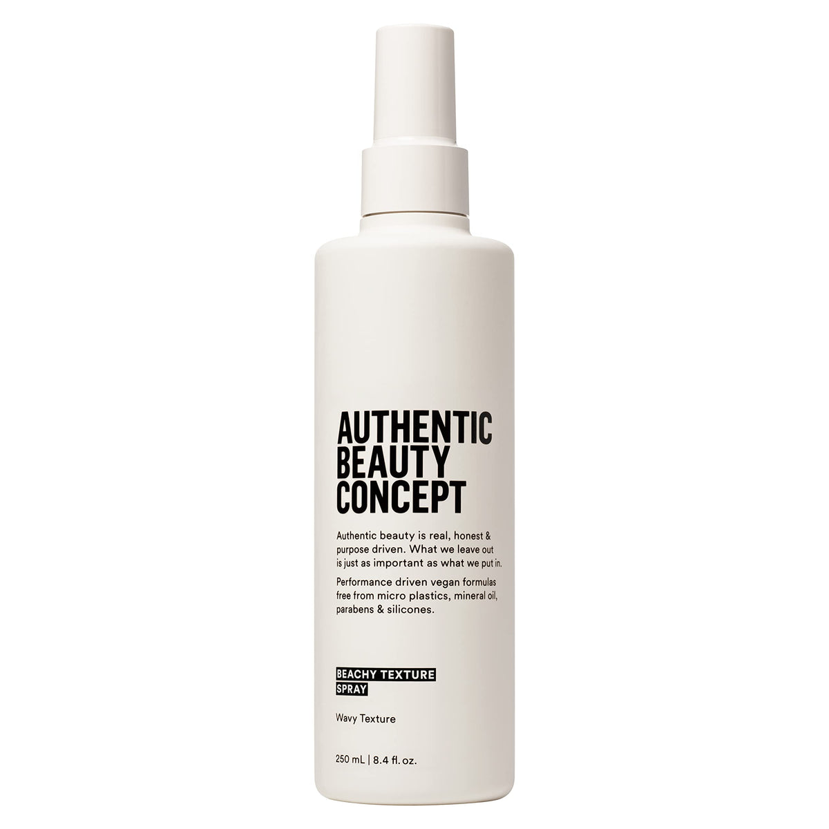 Authentic Beauty Concept Beachy Texture Spray bottle front showcases lightweight texture for tousled waves.