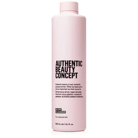 Authentic Beauty Concept Glow Cleanser bottle with pump demonstrates color-preserving formula for vibrant hair.