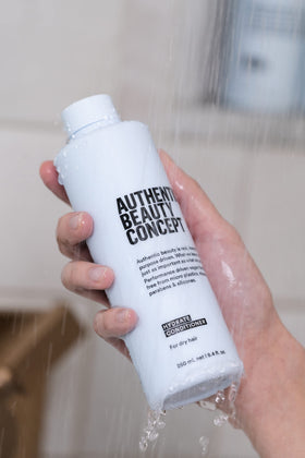 Creamy texture of Hydrate Conditioner on surface for smooth application