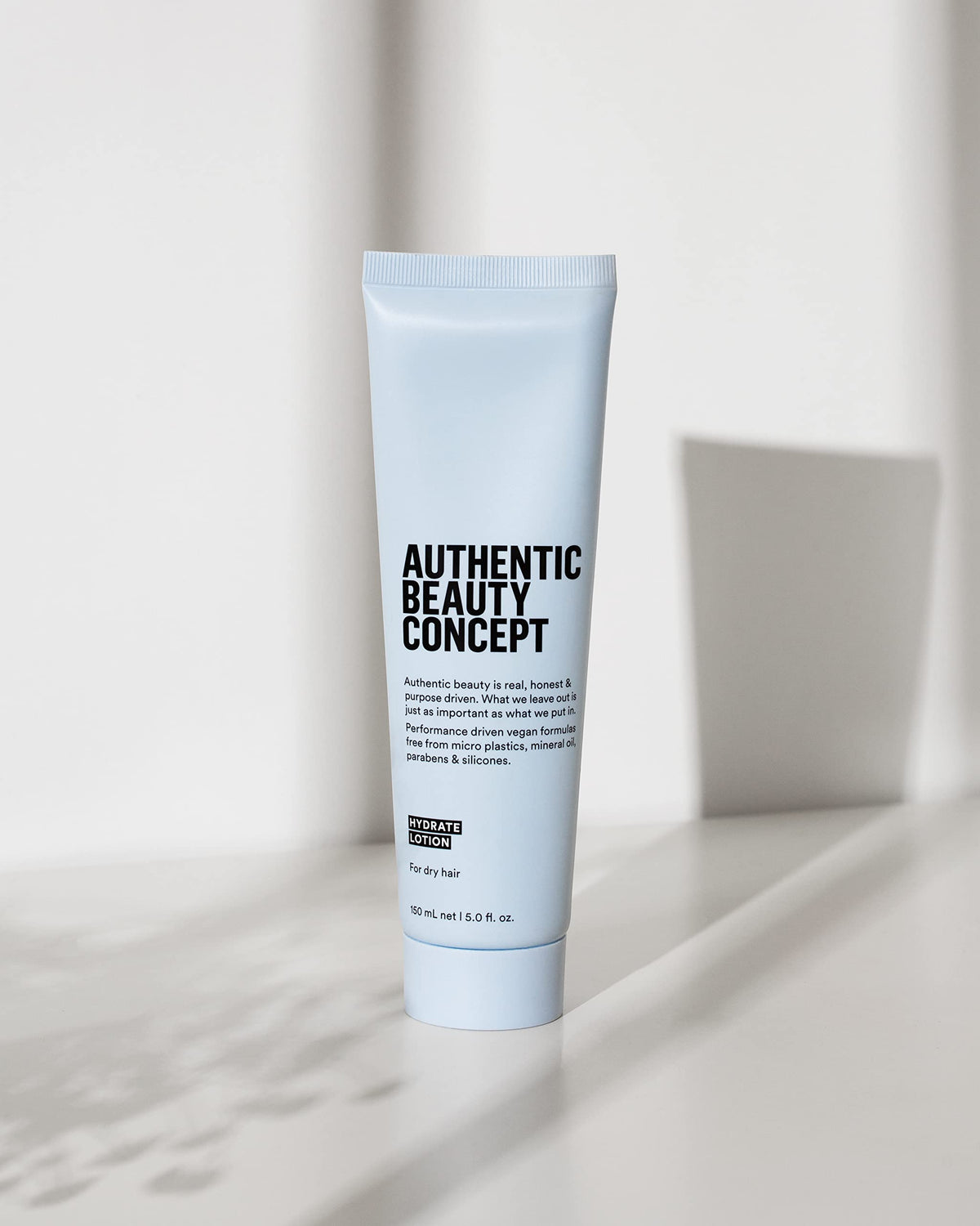 Authentic Beauty Concept Hydrate Lotion leaves silky ends after air-dried hair.