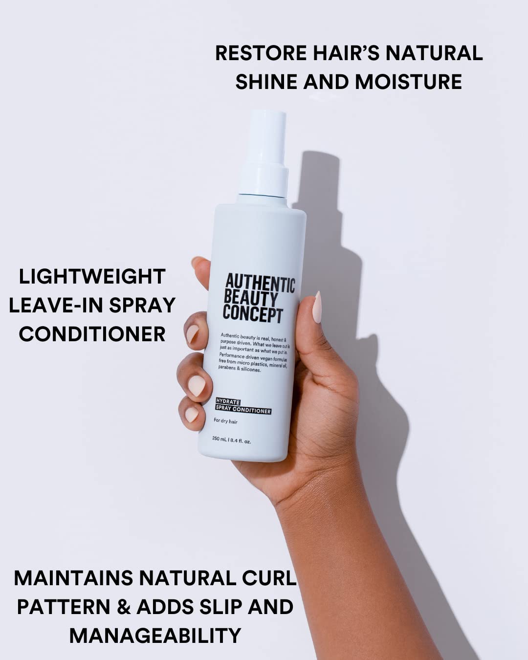 Authentic Beauty Concept Hydrate Spray Conditioner dispenser for quick, slip-enhanced styling.