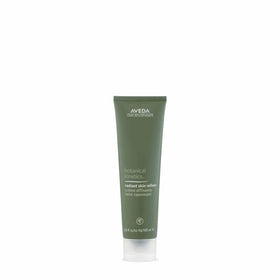 Aveda Radiant Skin Refiner jar showing creamy exfoliating texture for smoother skin.