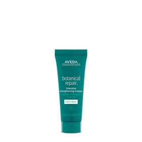 Aveda Botanical Repair Intensive Strengthening Masque Light bottle close-up showing weightless conditioning.