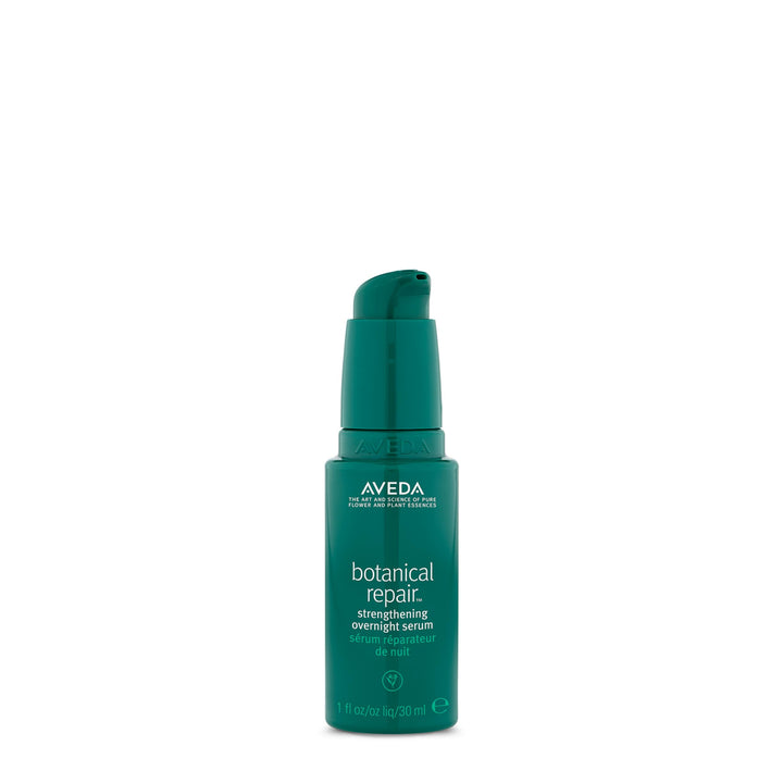 Aveda Botanical Repair overnight serum bottle close-up showing sleek packaging and luxury feel.