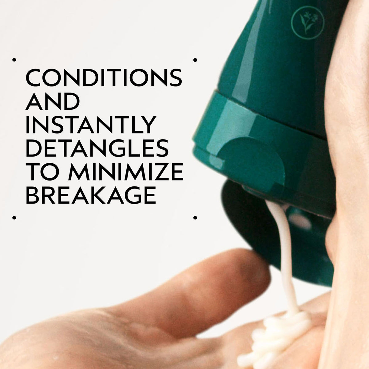 Aveda Bottle label closeup highlighting plant-powered formula for detangling and smoother hair