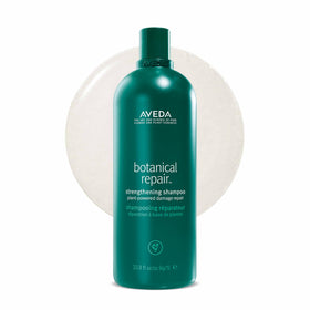 Aveda Botanical Repair Strengthening Shampoo bottle, silicone-free formula for stronger, nourished hair.