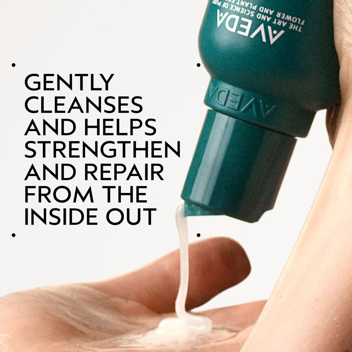Aveda Botanical Repair Strengthening Shampoo pouring action, evenly distributing cleansing and bond-building care.