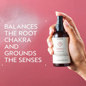 Aveda Chakra 1 label close-up highlighting organic oils for balance.