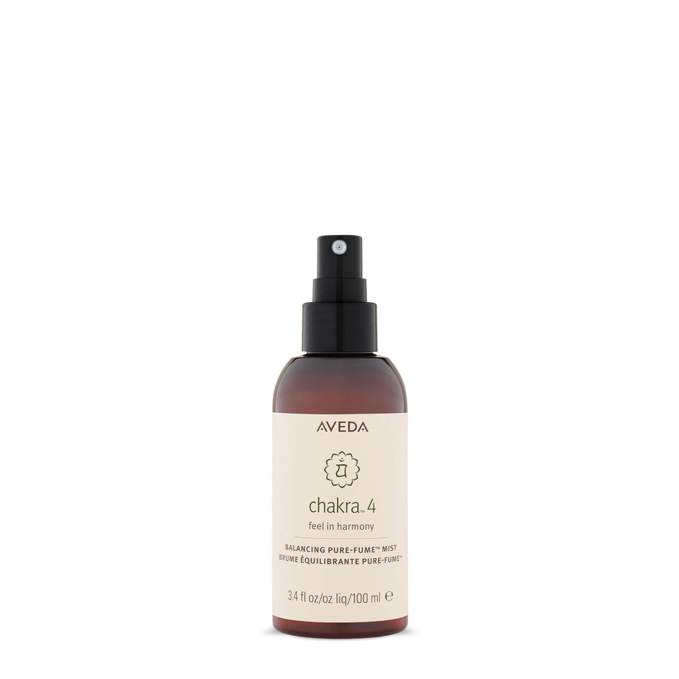 Aveda Chakra 4 Heart Balance bottle close-up for calming rituals.