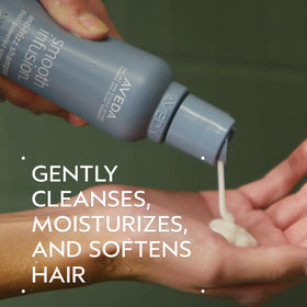 Close-up of creamy lather from Aveda Smooth Infusion shampoo for smooth results.