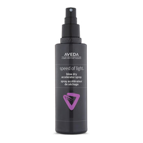 Aveda Speed of Light bottle being poured for easy application and faster styling