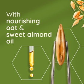 Aveeno Creamy Moist Oil pump shows easy application and quick absorption