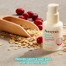 Aveeno Calm + Restore application shows dime-sized amount on clean skin.
