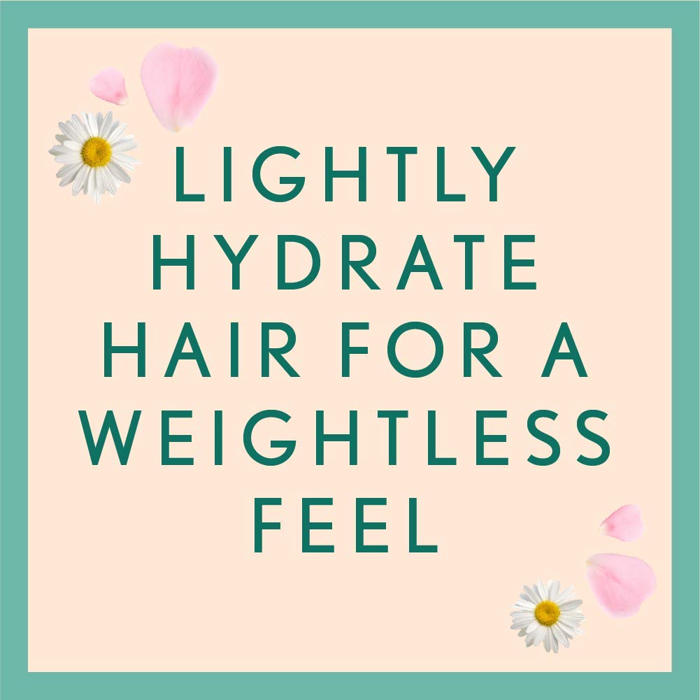 Aveeno Rosewater and Chamomile shampoo pour, soothing scalp care.